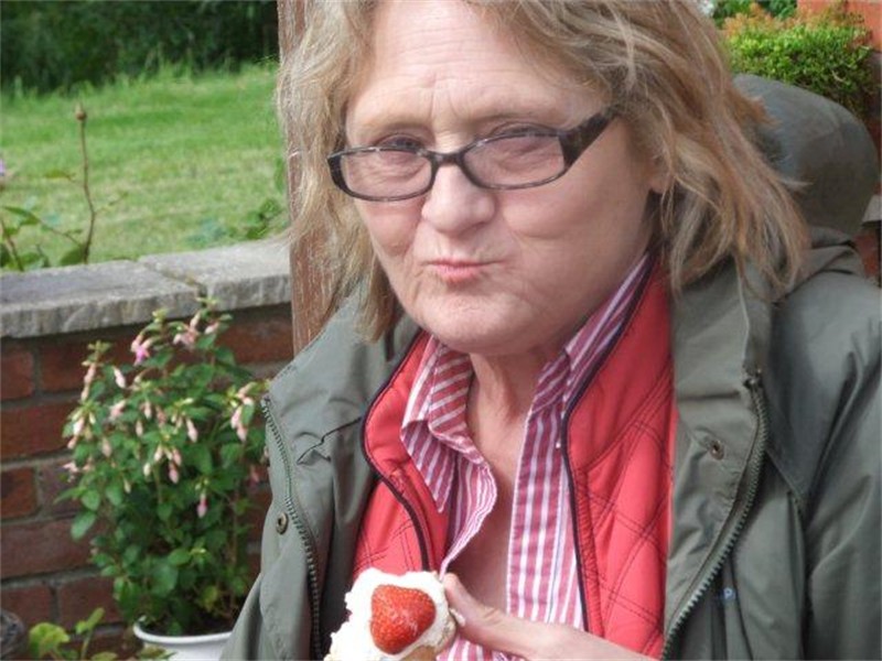Denise devouring Strawberry scones